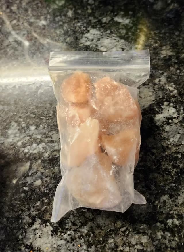 One sealed 100 gram pack of raw Himalayan salt rocks as it arrives; the 2 Pack includes two packs