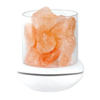 Cordless Himalayan salt glow lamp with lit pink crystal on a white background