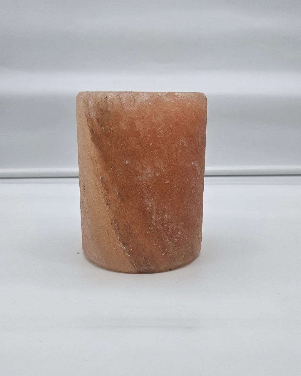 Cylinder salt candle holder in daylight