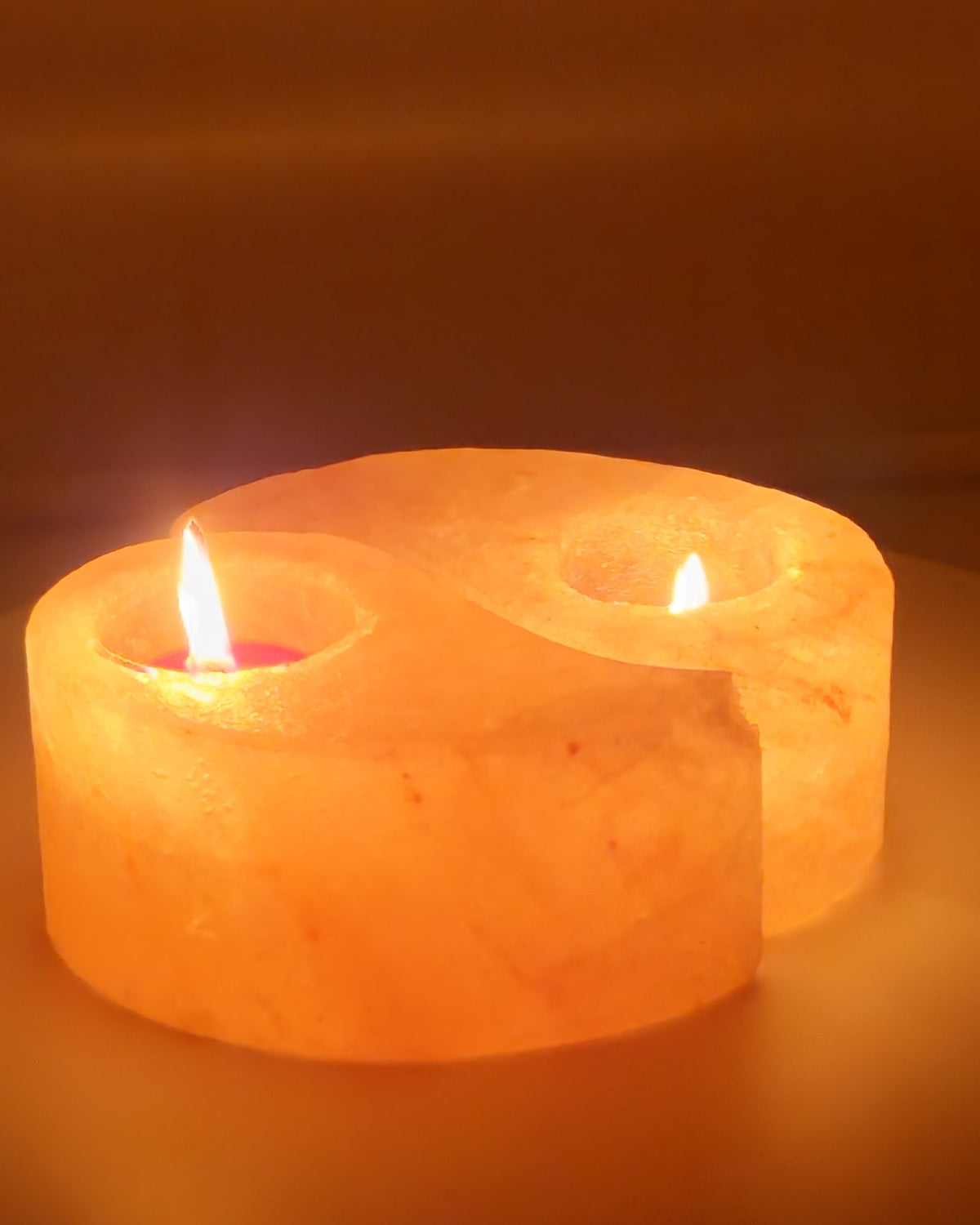 Ying yang salt candle holder, both halves lit