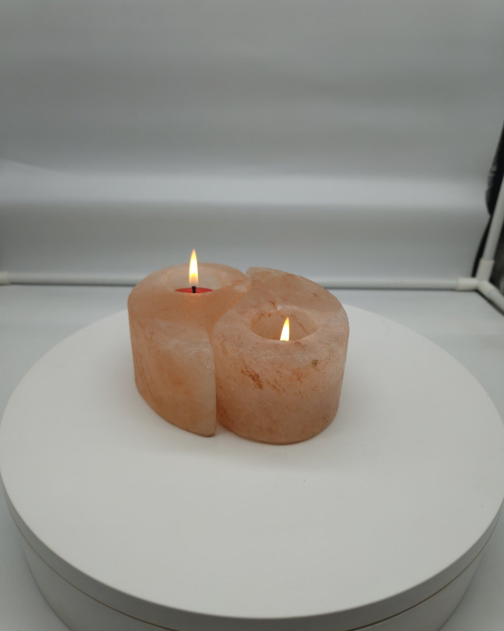 Ying yang salt candle holder in daylight, halves together