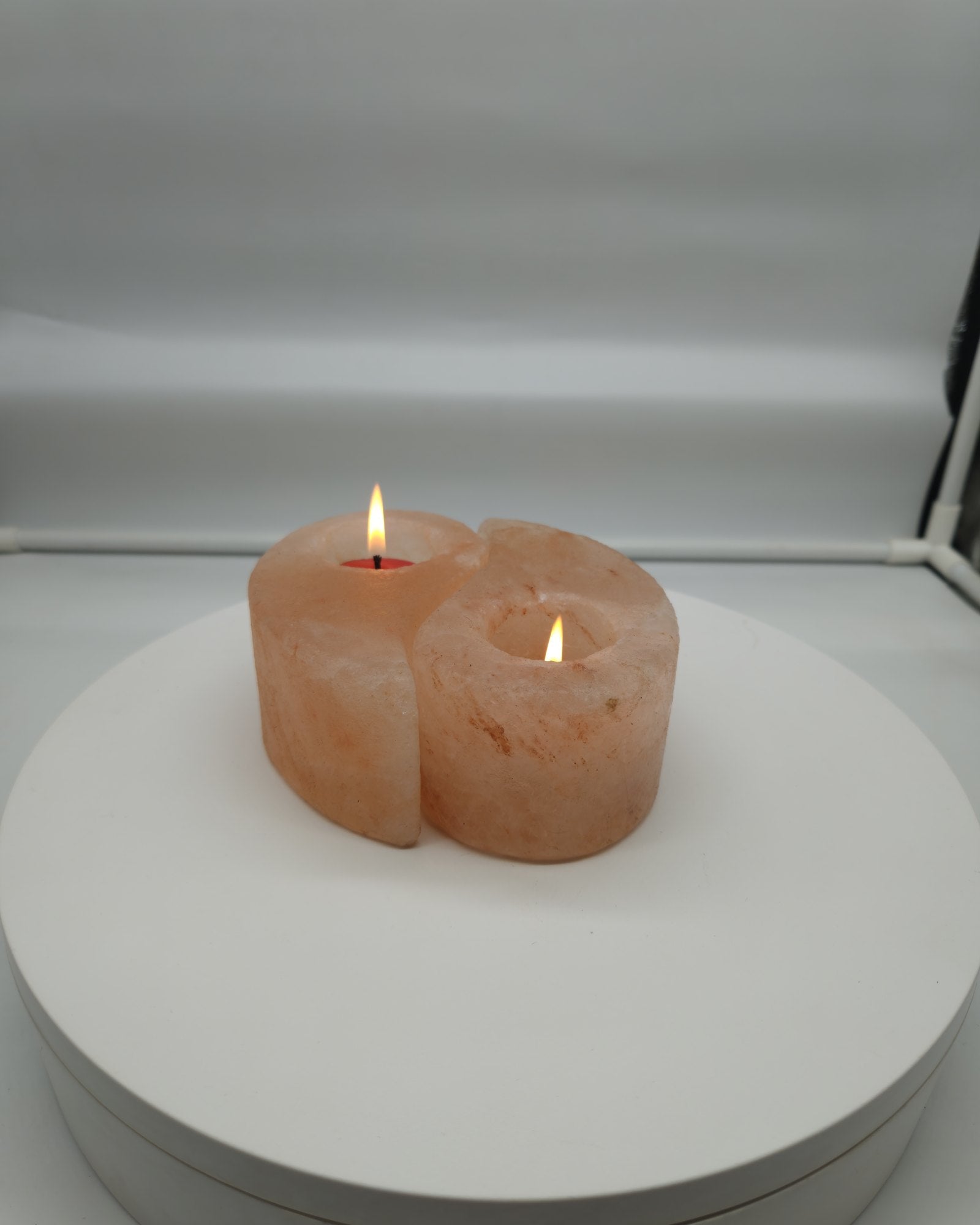 Ying yang salt candle holder in daylight, halves together
