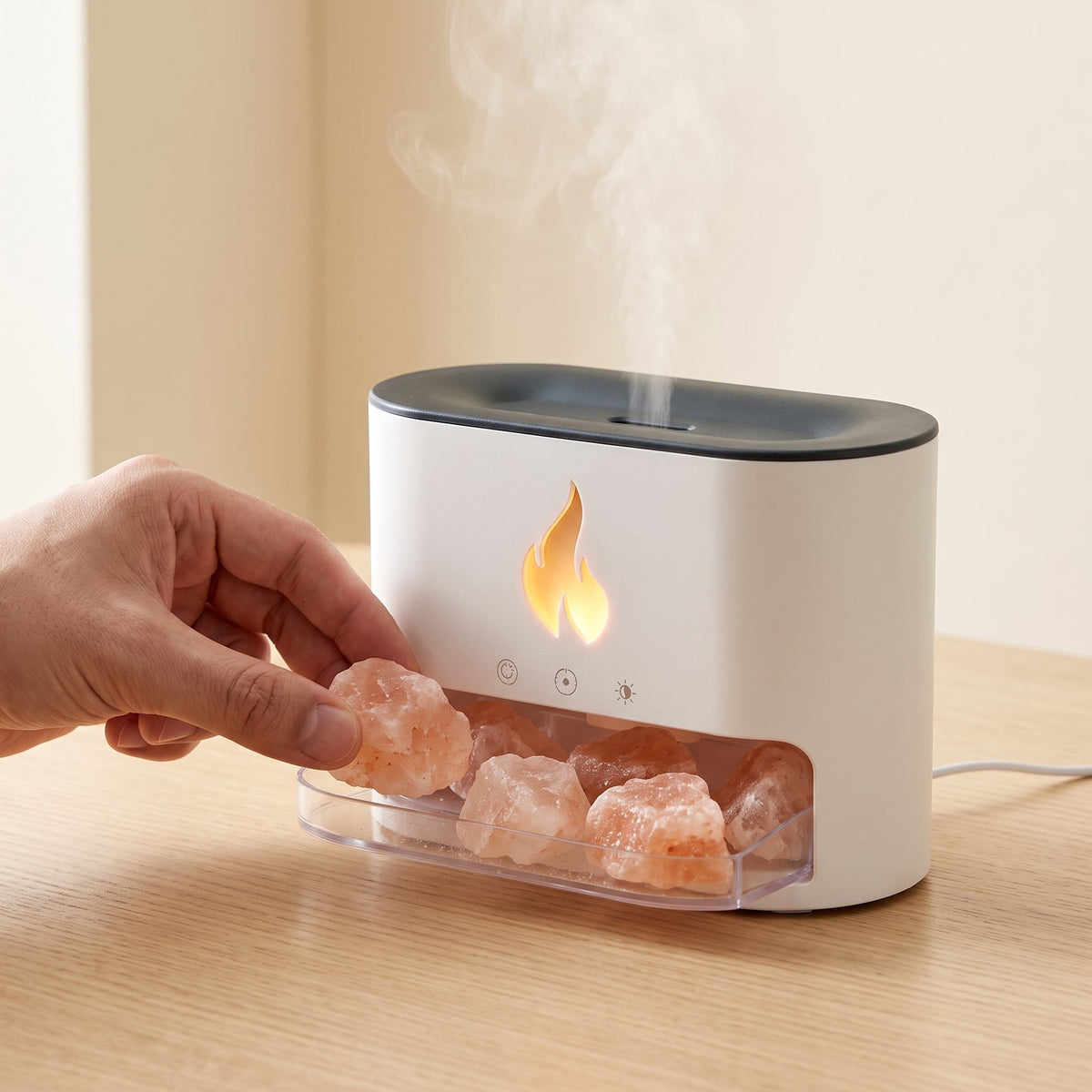 Hand beside the Himalayan salt flame diffuser showing its compact size