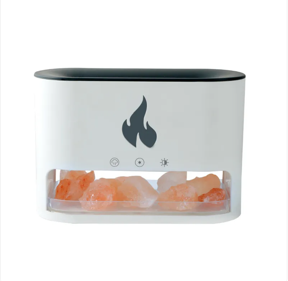 White Himalayan salt flame diffuser with pink salt crystals glowing in the tray