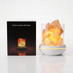 USB salt glow lamp beside its retail box