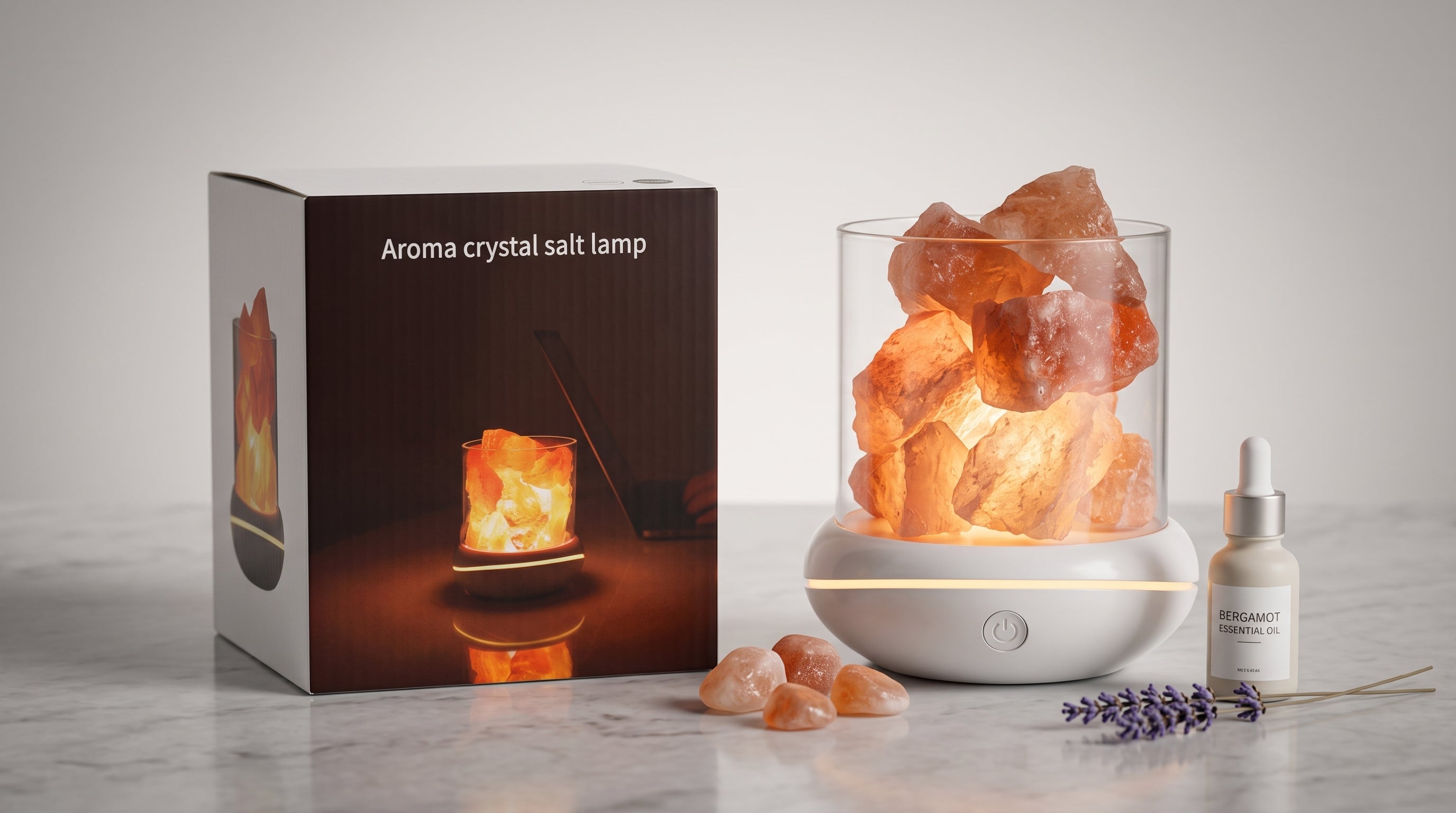 USB salt glow lamp glowing warm on a marble surface beside its box