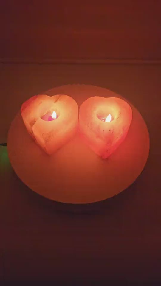 Heart shaped salt candle holder with a lit tea light