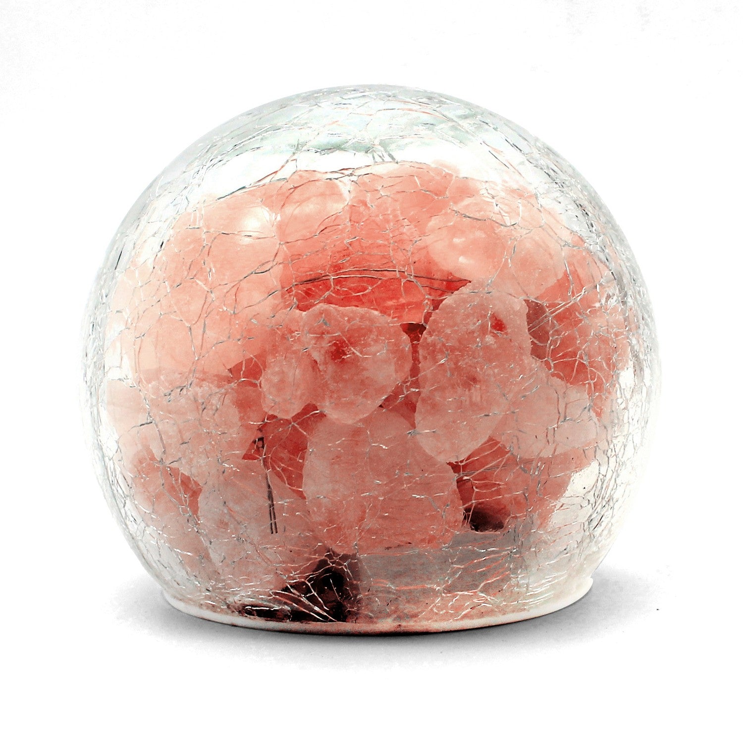 Battery powered mini Himalayan salt lamp unlit on a white background: rough pink salt pieces sealed inside a clear crackle finish glass globe on a white base