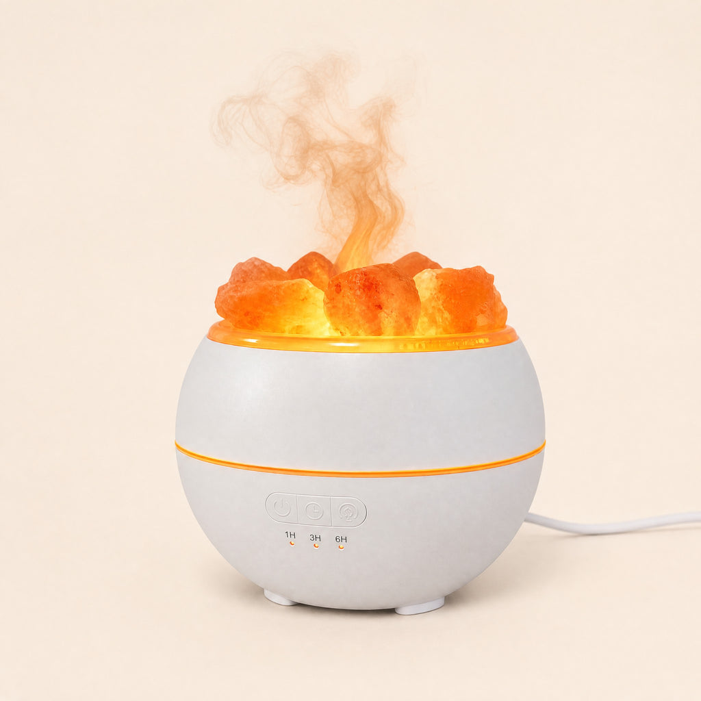 Mini Himalayan salt flame diffuser running, salt chunks lit and mist rising, USB cable visible