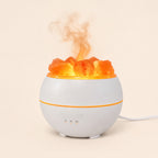 Mini Himalayan salt flame diffuser running, salt chunks lit and mist rising, USB cable visible