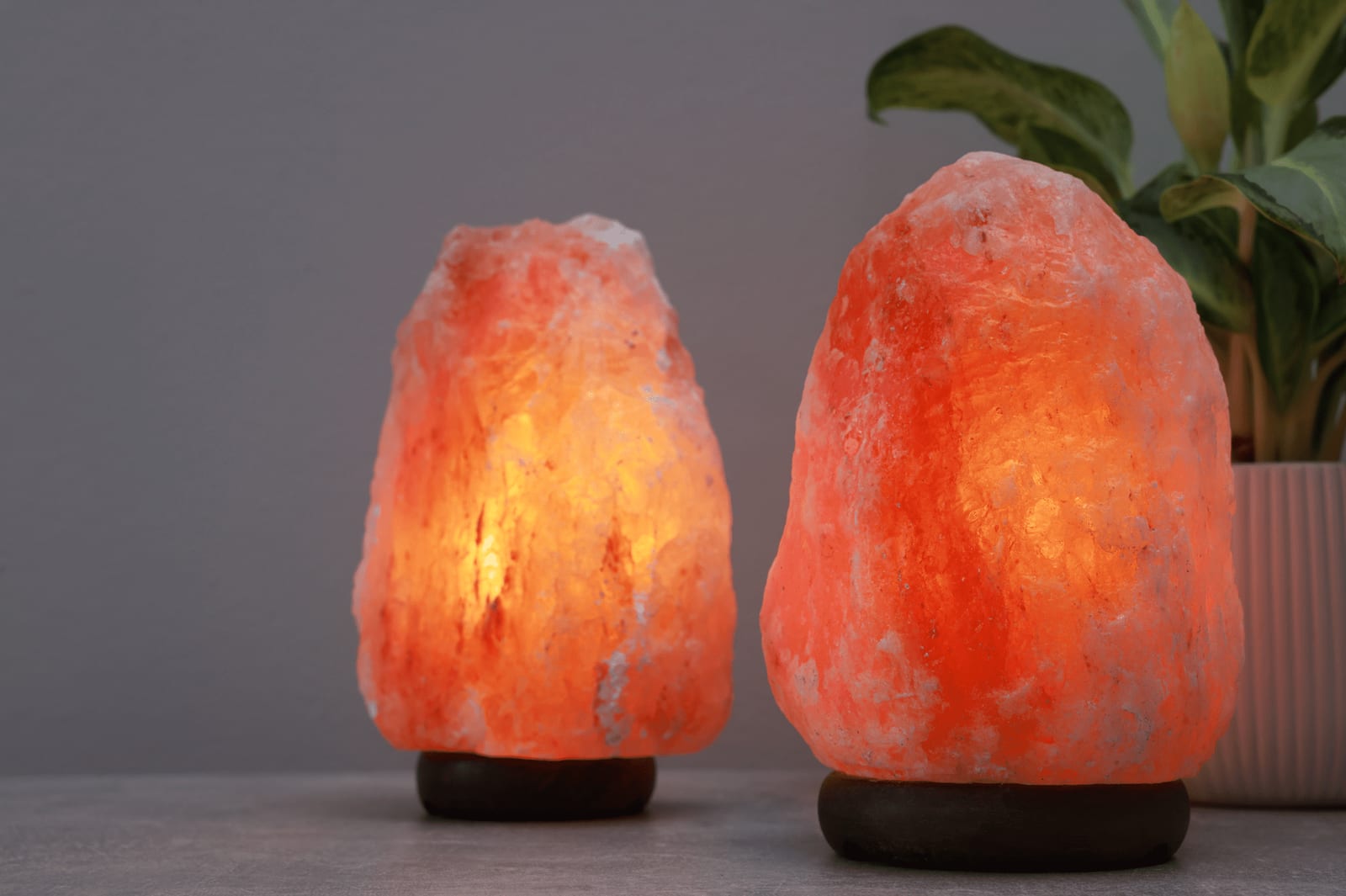Glowing Himalayan salt lamps at dusk