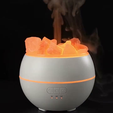 Himalayan Salt Flame Diffuser lit with flame-like mist rising through Himalayan salt